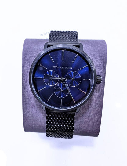 Montre Homme Michael Kors – Boîtier Noir & Cadran Bleu Saphir (Bracelet Maille Milanaise).