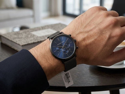 Montre Homme Michael Kors – Boîtier Noir & Cadran Bleu Saphir (Bracelet Maille Milanaise).