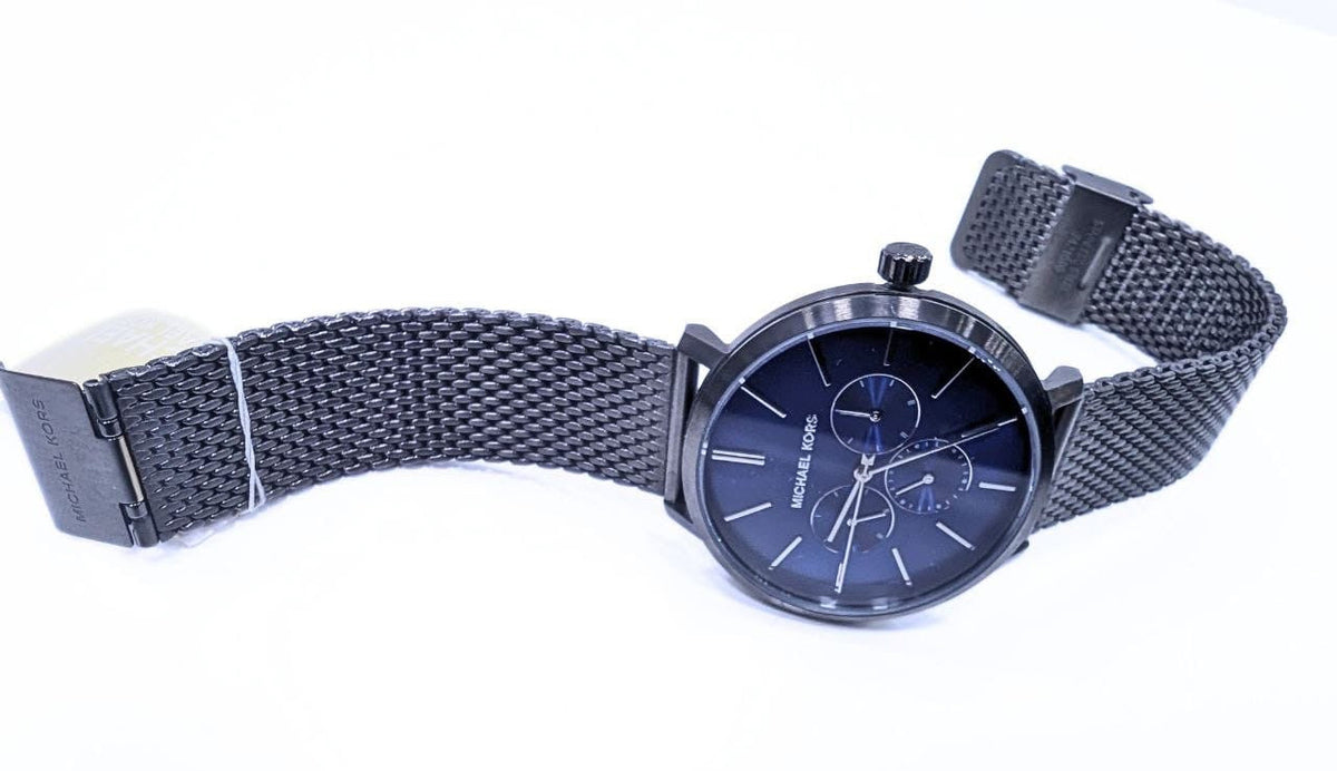 Montre Homme Michael Kors – Boîtier Noir & Cadran Bleu Saphir (Bracelet Maille Milanaise).