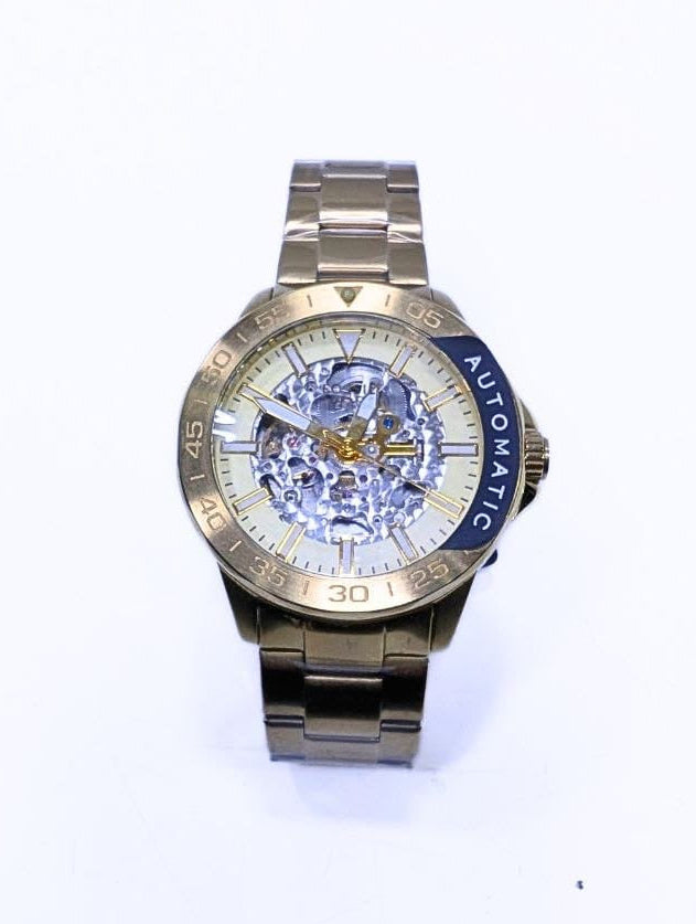 Montre Homme Fossil Automatique Squelette – Boîtier & Bracelet Dorés.