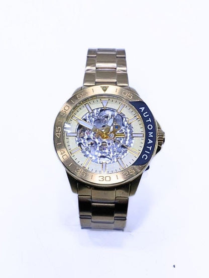Montre Homme Fossil Automatique Squelette – Boîtier & Bracelet Dorés.